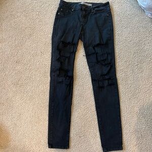 Ripped style black jeans